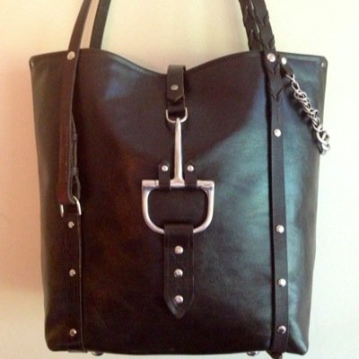 Designer of equestrian inspired custom handbags, belts & jewelry.