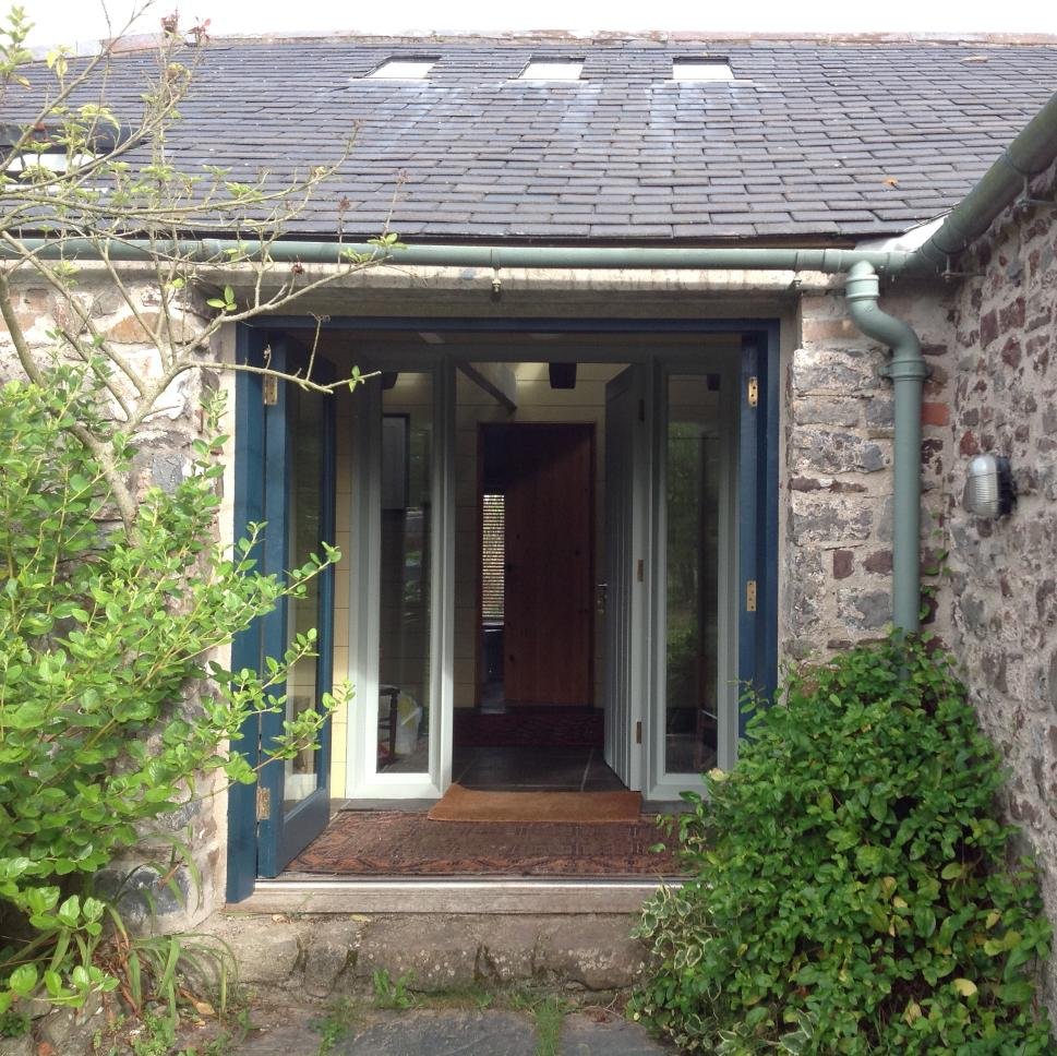 Architect owned and converted farm buildings in quiet rural setting close to the sea, within the Pembrokeshire Coast National Park.