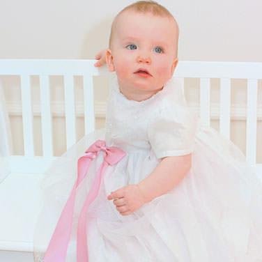 Oli Prik has unique and fashionable christening / baptism wear for your baby girl or boy. Large selection of christening dresses and baptism gowns.