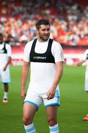 He's not fat, he is just gigantic                                LFC fan