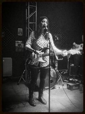 maker of noises + scribbler of words + geeklife + vox/guitar for Harlot.