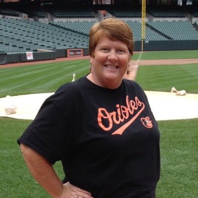 Mom, sports junkie, particularly drawn to the O’s and auto racing.