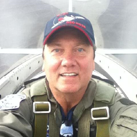 Retired naval aviator and Desert Storm veteran.