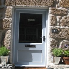 An old fisherman's cottage in Downalong, the very heart of St. Ives. Now taking bookings for 2015. Located right next to Porthmeor and Porthgwidden Beaches.