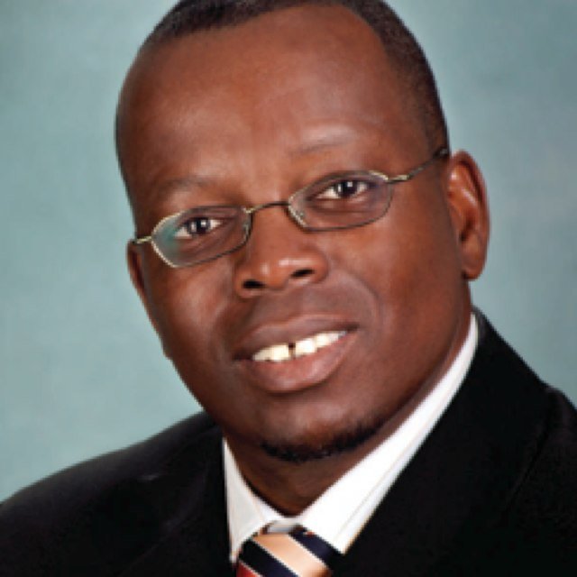 Prof John Tibane