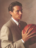 Head coach of the NBADL's Austin Toros. Former University of Missouri men's basketball coach.