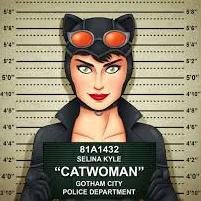 Little birds should stay away from big bad kittycats...When not out on the prowl I enjoy many things... especially Batman & Cats!!