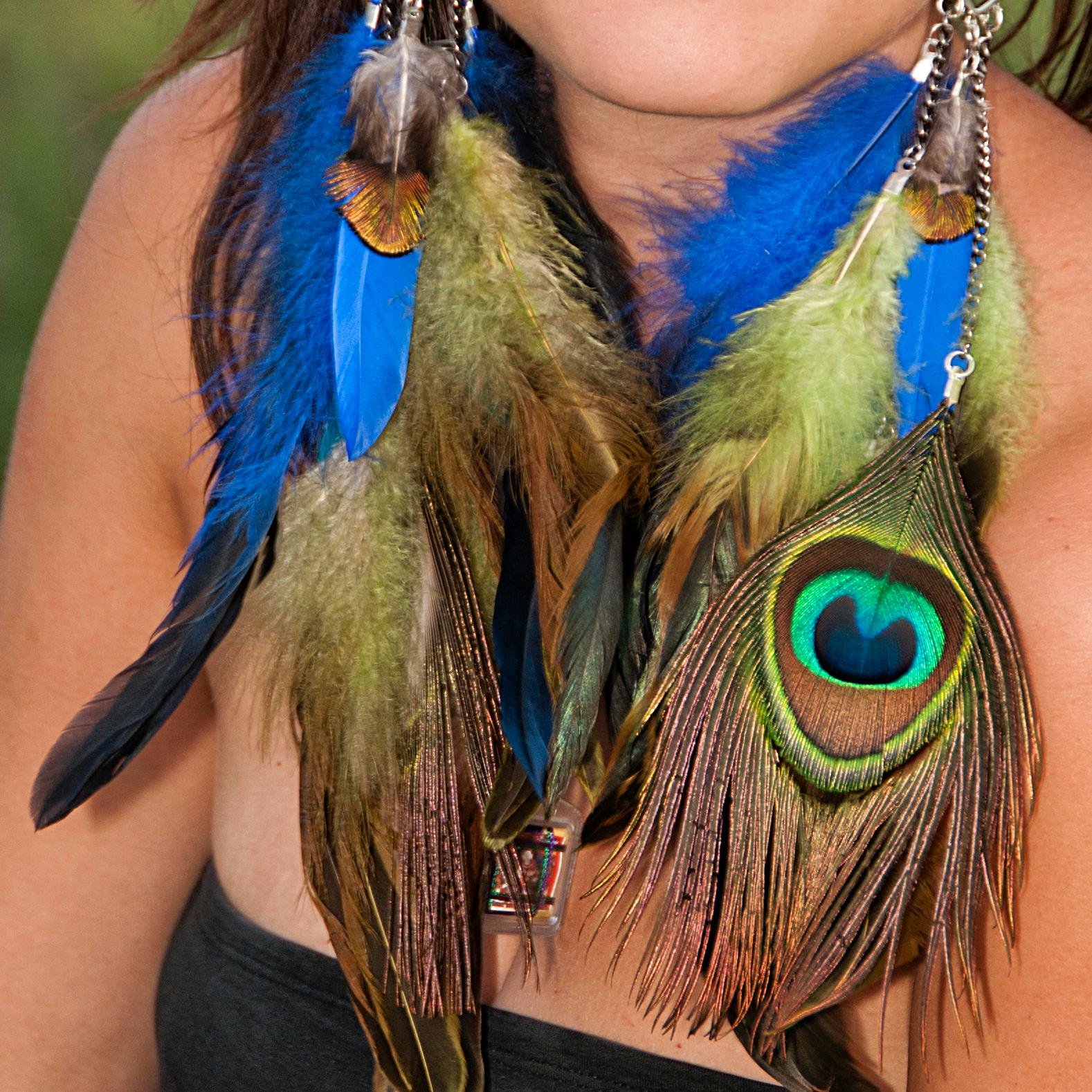 Tribal Inspired feather adornments and clothing to awaken the inner Divine Feminine and enhance the Light Body.