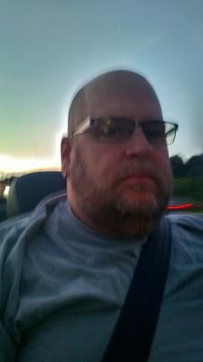55 year old, highly liberal, democratic, member of the gay bear community.
