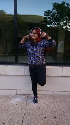 Name:Trang Mae Baumann 
Favorite things: music poems and my son Eli