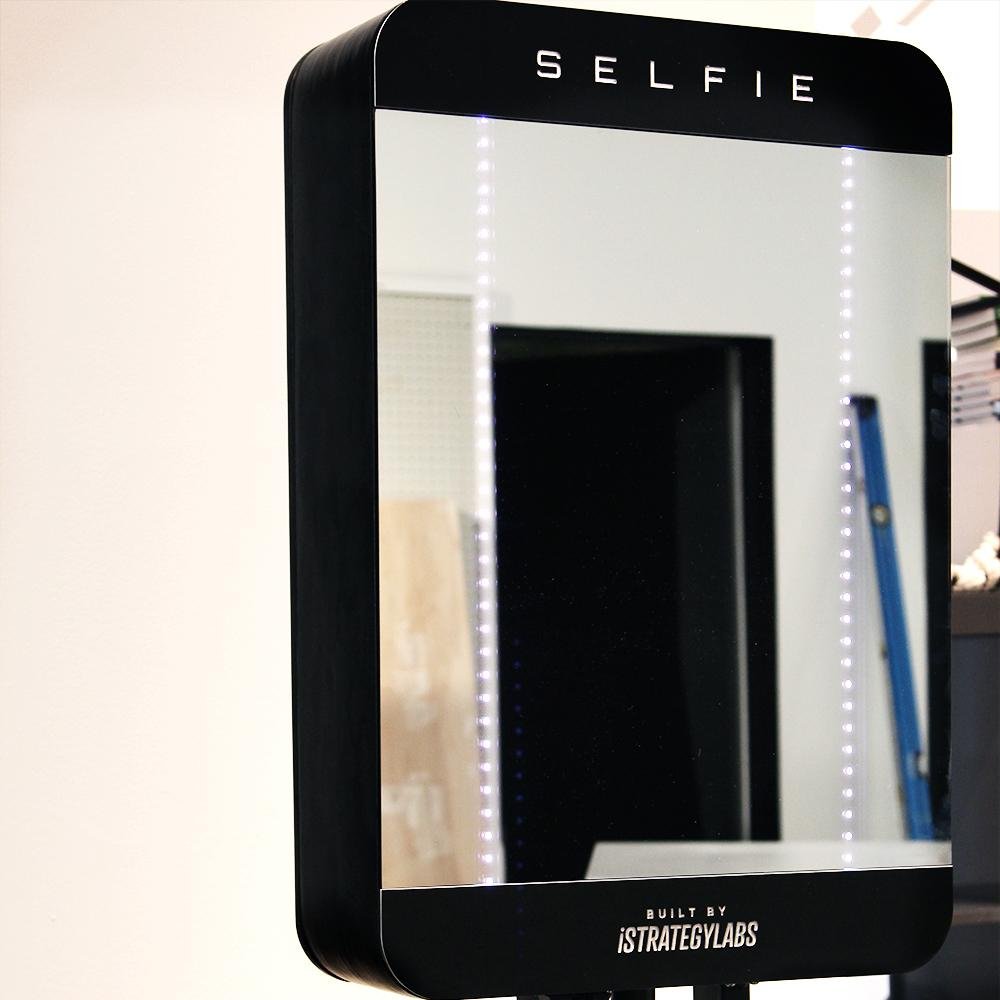selfiemirror's profile picture. Strike a pose! #SELFIE, the hands-free 'smart mirror’ by @iStrategyLabs takes your photo when you smile and posts it on @Twitter! #SelfieMirror