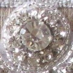 we offer a great range of inexpensive rhinestone and crystal appliques and trims for bridal and evening wear.  Check out our online shop