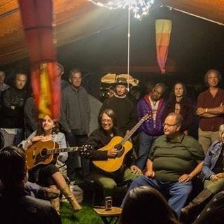 Alan Rowoth's Big Orange Tarp, a Musical Meeting Place since 1994, creating performance opportunities for musicians and helping connect listeners with music.