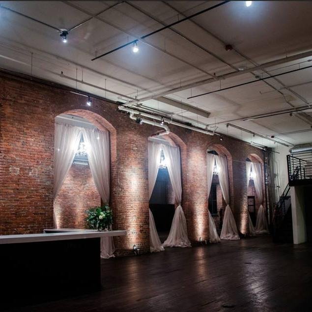 Photo studio, special event venue, gallery. 6000 sq ft, 18 ft brick arches and the site of Doc Maynard's home. Rockin!