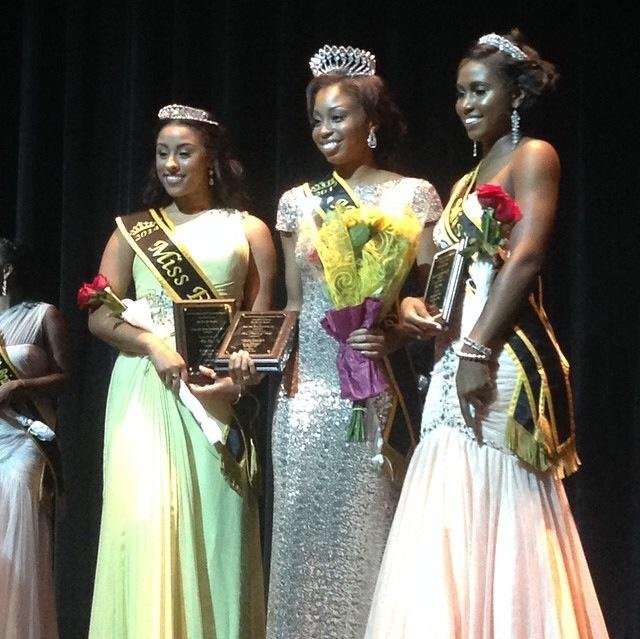 Royal Court of the Eta Nu Chapter of Alpha Phi Alpha Fraternity Inc. Shaunaci Cage-Miss Black and Gold, Cami Lee-Miss Eta Nu, and Janae Brown- Miss 1906