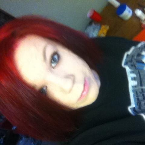 Some strange girl with red hair who listens to heavy metal and is a great artist