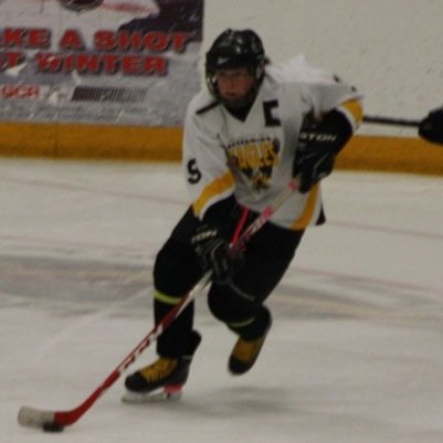 Captain of the Elite Eags D1 Hog Oil Alumni