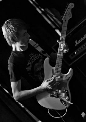 Electronic Engineering student at University of Surrey and guitarist - I play at playing music