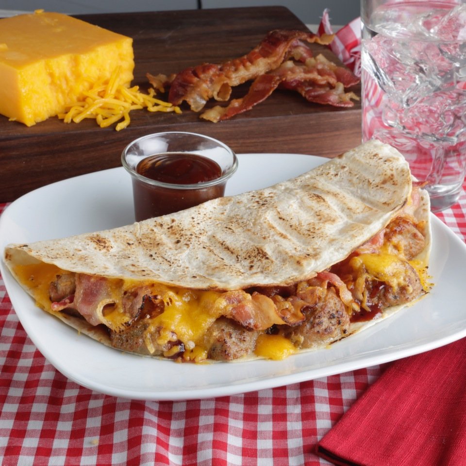Heard of the quesadilla? Give it a full-scale revolution! We believe in no limitations to what is possible with our menu. If you can think it, we can do it!