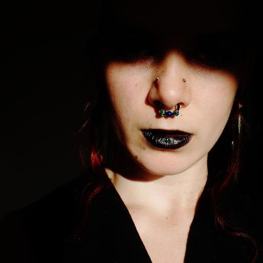 Antifa ninja. Hardline activist goth. They/them.