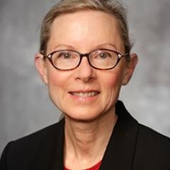 Dona is retired from Friends University.  She is married to Rick, with whom she shares ten grandchildren.