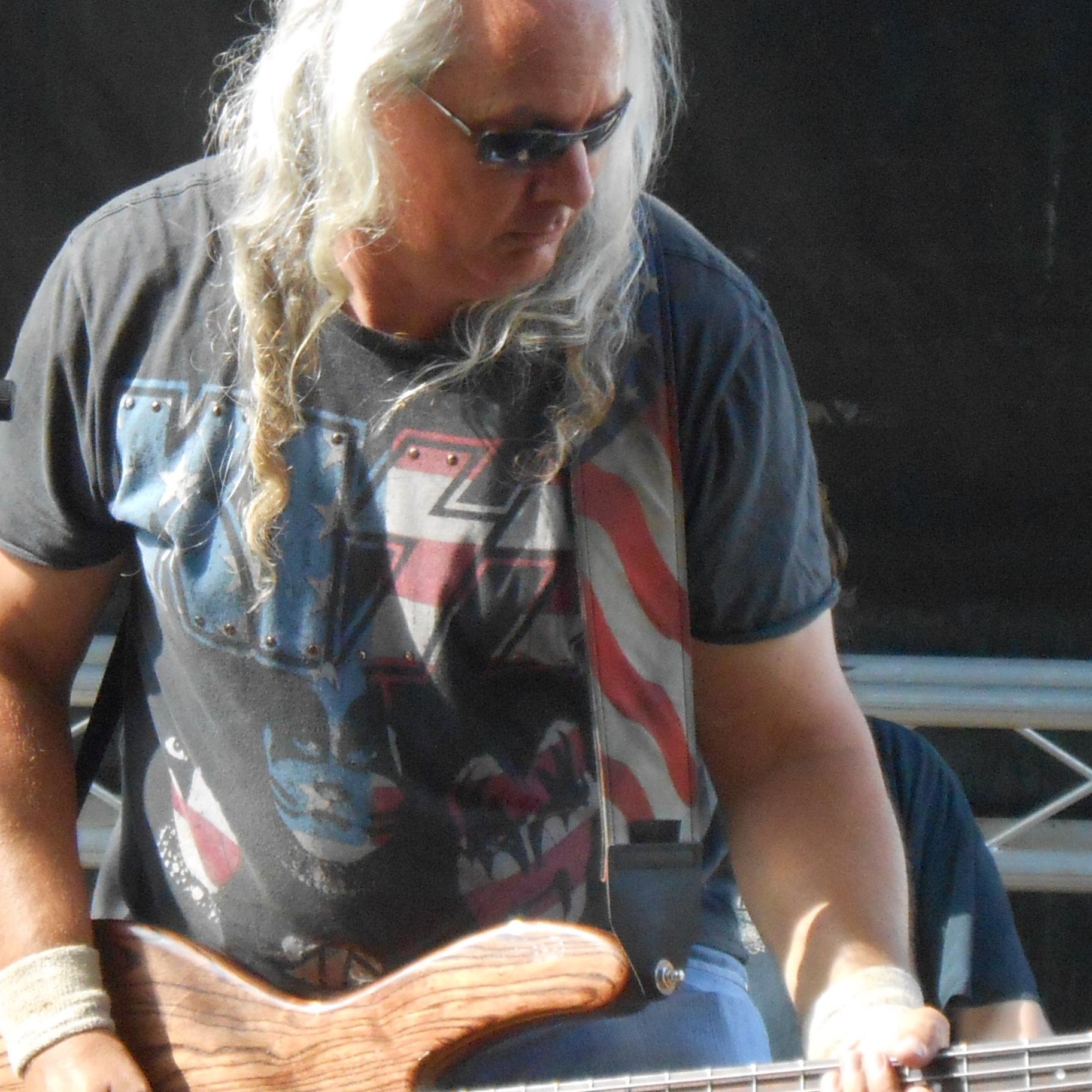 Husband.....Father...Owner operator(Fedex) Bass player with Stated Quo...Nogrooveandfeelist......