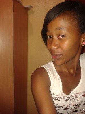 Friendly,  laughs carelessly,  mother to my daughter, from limpopo,