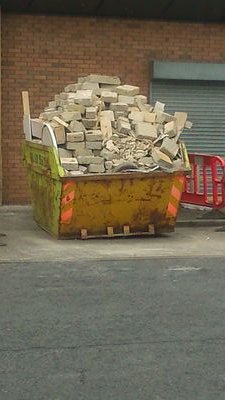 I'm not taking that mate, youll have to pay for another skip....Looking For The Best Overloaded Skips.