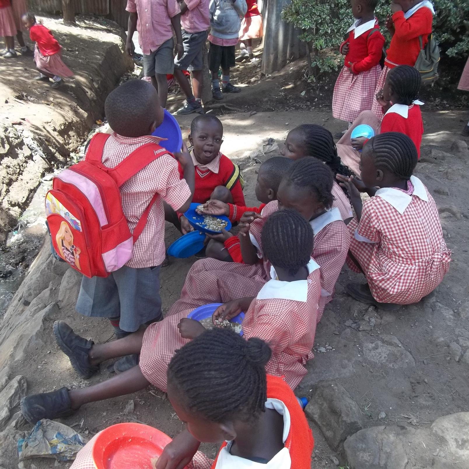 A charity organization reaching out to 1,300 children daily with food, education, health care & shelter in Kenya slums.