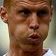 Dilapidated art hound. Does nothing but read novels. More neck than Martin Keown.