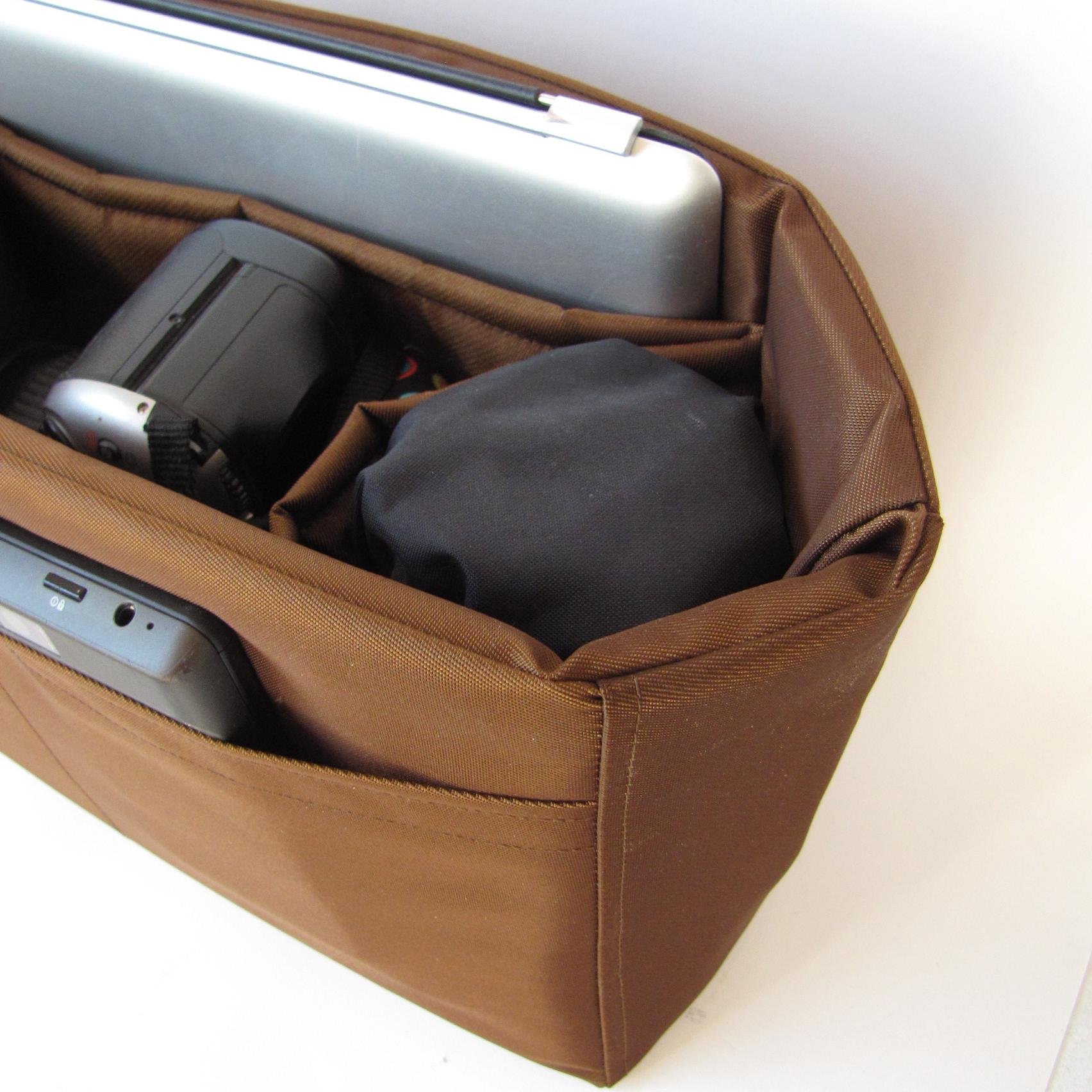 Specializing in custom camera bag inserts, handbags & accessories.