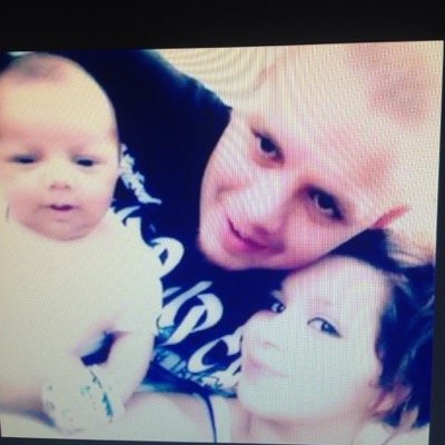 In this picture it is my cousin,her boyfreind,and her baby