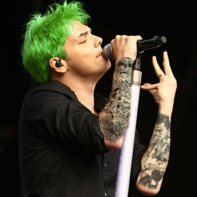 Green hair and tattoos, not exactly the type of person society aproves of but oh well.