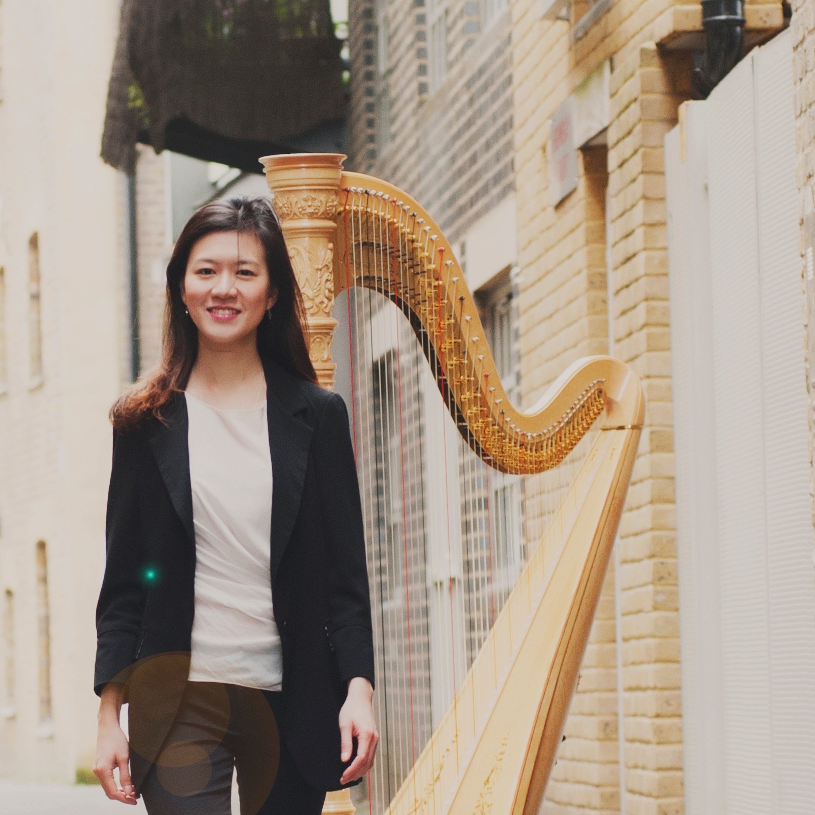 Harpist of the Singapore Chinese Orchestra. With the harp in my hands and joy in my heart, music shall follow me and may my life be a symphony of praise