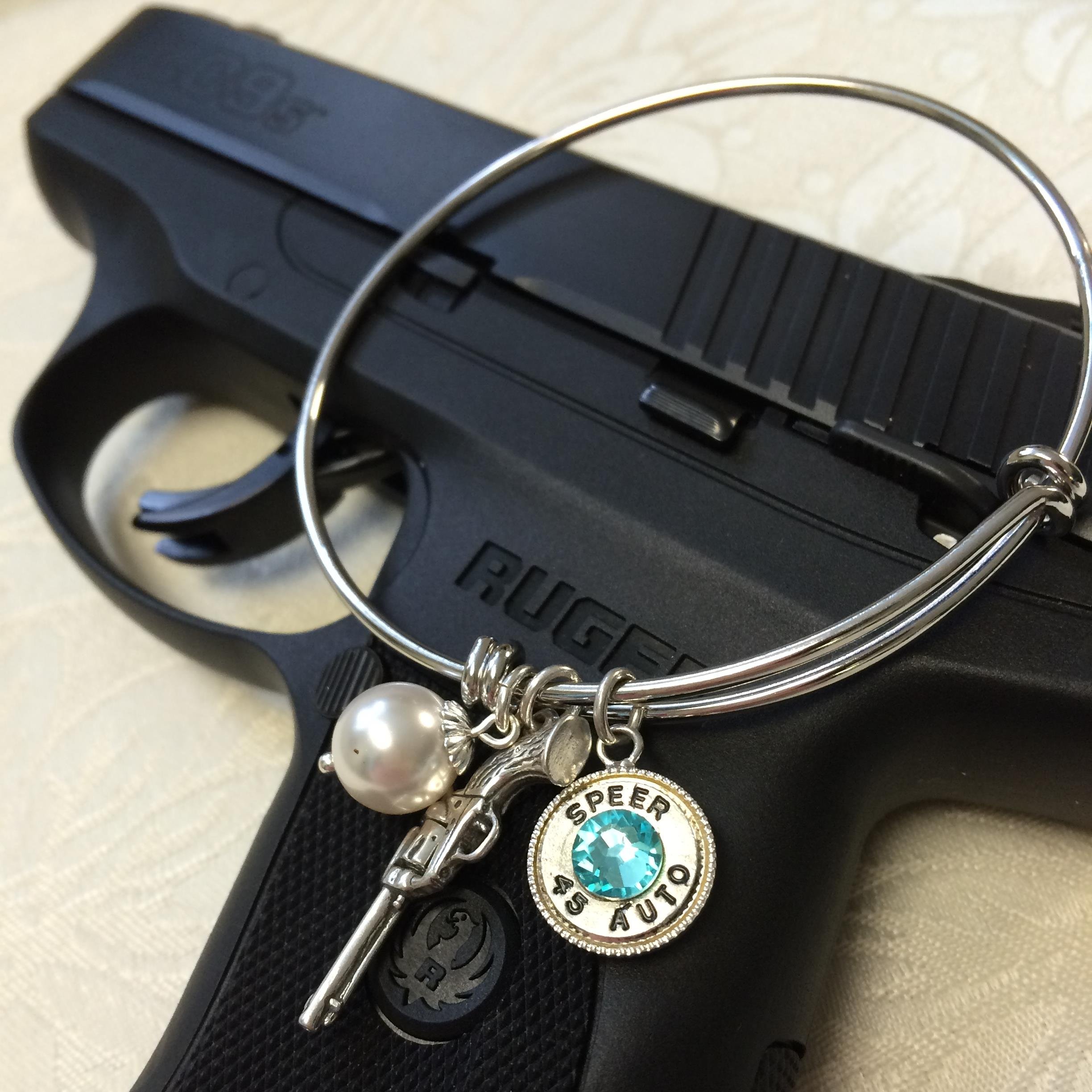 Elegance From Ammo ~ Gold & silver plated bullet rims, made into beautiful bullet jewelry.