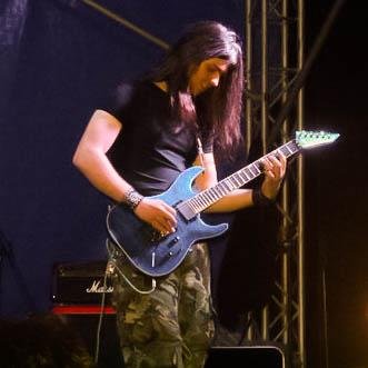 I am Dimitar Tabakov from Bulgaria, but my friends call me Tabak. I work as a web developer and in my free time I play the guitar in my band Inflict.