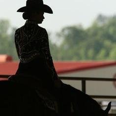 A bashful equestrian who can handle 1200lbs animals, yet is unable to must up the courage to talk to the guy she likes.