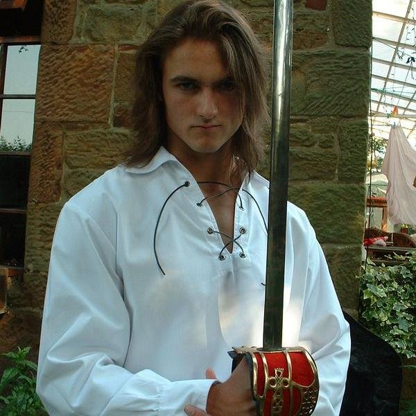 Wrestler for UWF, car lover, married to  Maeve Genesis