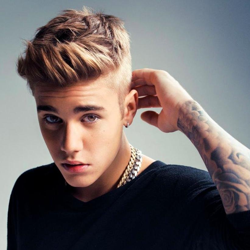 A Belieber, live tweeting latest Bieber news.