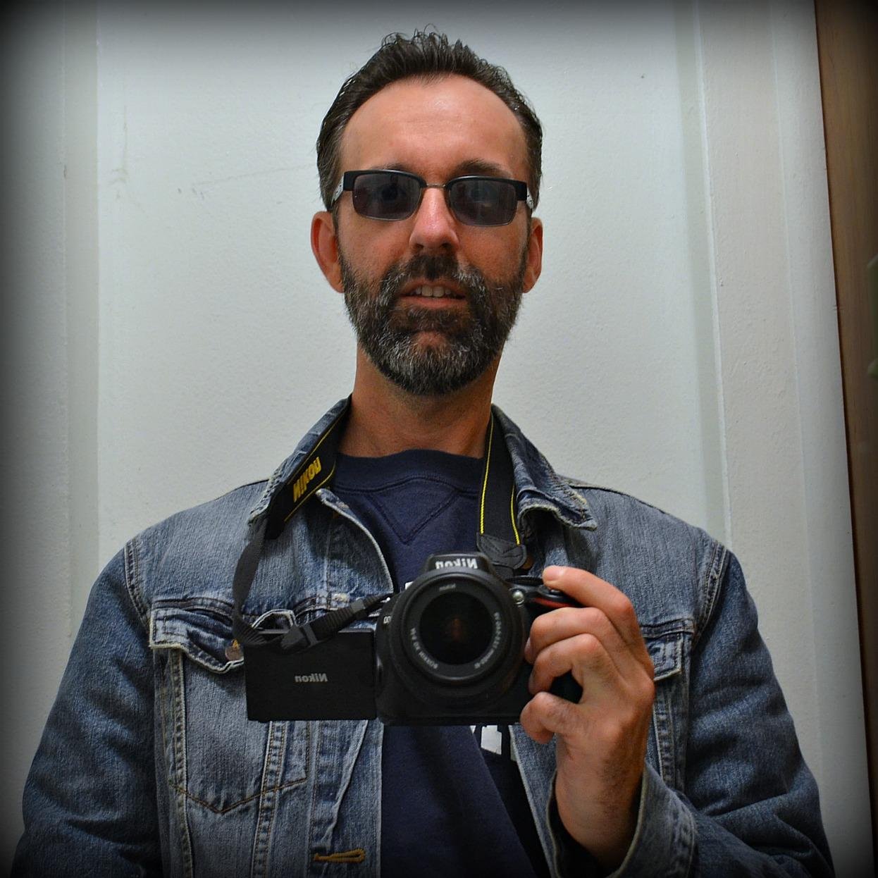 punkbrarian, father, swim, bike, run, photos, live music, hack guitar player, graving/cemeteries, & the Chicago White Sox.