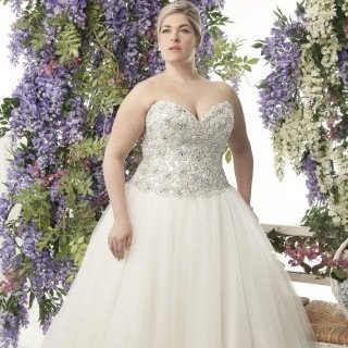 The Only Plus-Size Specialist Bridal Boutique in South Wales. Stocking Wedding Gowns Size 18-36 & Bridesmaids Dresses Size 6-32.