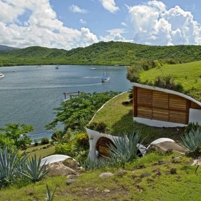 Mount Hartman Bay Estate is a privately owned luxury boutique hotel in Grenada with 2 private beaches, 2 swimming pools, a private dock and helipad