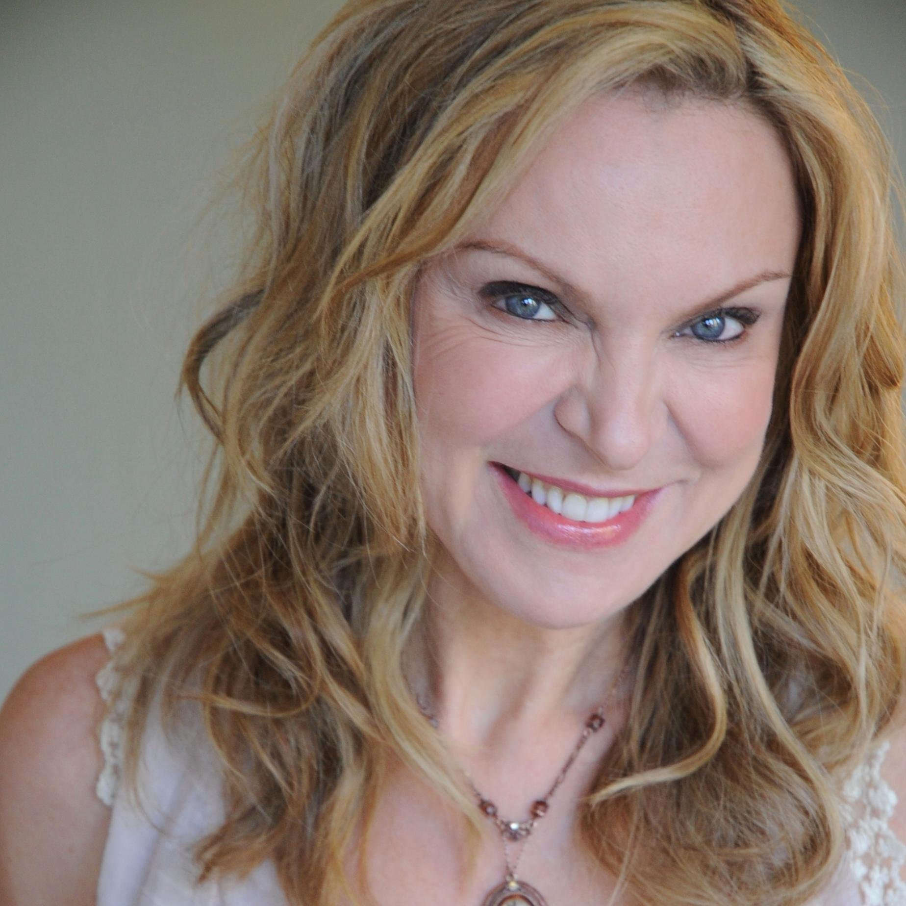 Lu Ann is the singer/songwriter/bassist for her kick ass band Redneck Pop!