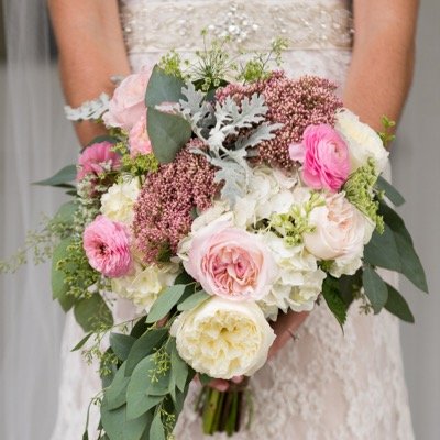 we love flowers, we love making people smile, we love weddings, we love sharing our knowledge Tallahassee owned and operated Florist, A Country Rose