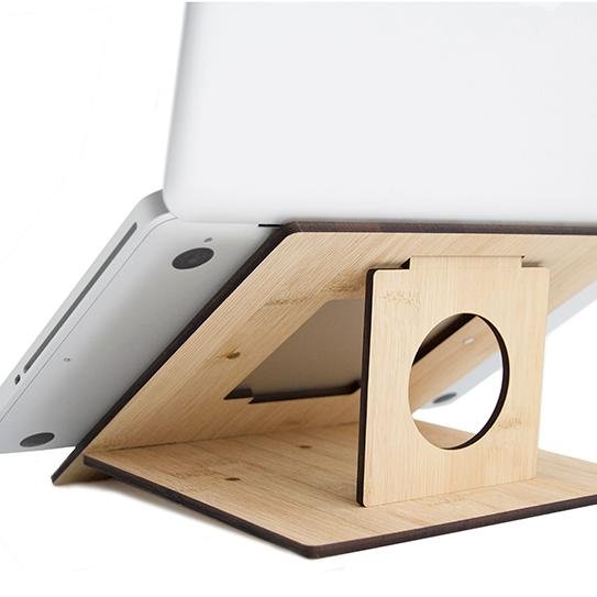 Ultra slim, portable and #ergonomic wooden #laptop riser stand. NOW on #Kickstarter. Tweets by Vlad Butucariu