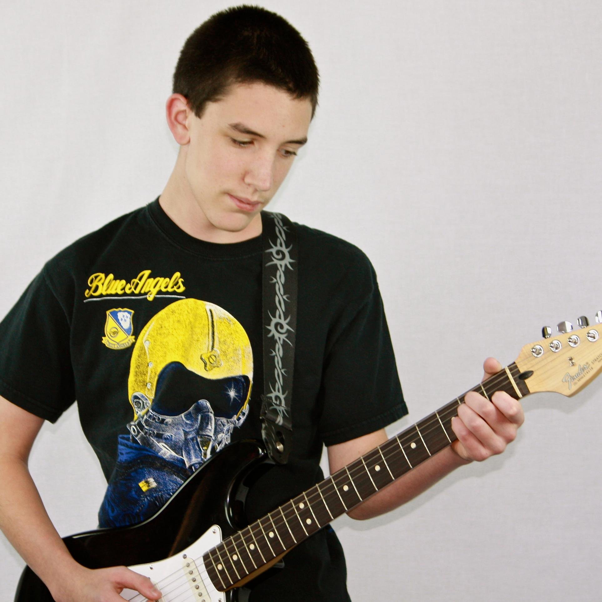 Rochester NY's largest privately-owned music school offering lessons in guitar, voice, piano, bass, drums, violin, ukulele, and banjo for ages 4 and up.