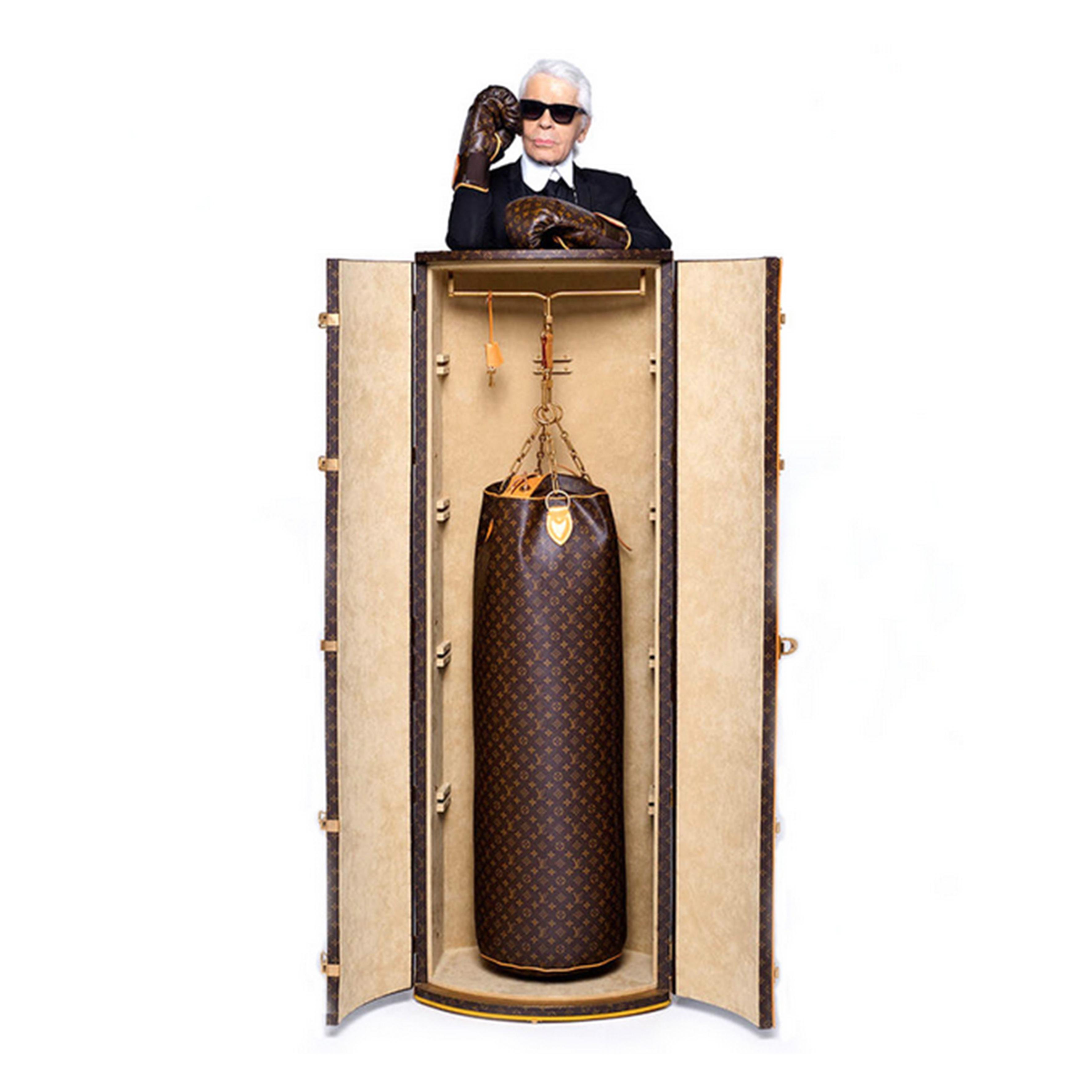 This is the twitter account for a kickstarter project that aims to buy a 175K USD LV punching bag and have as many people as possible punch it.