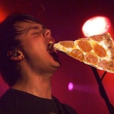 Mikey is life... and so is pizza. 2 founders, 1 love for 5SOS.