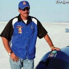 I write books and race fast motorcycles.