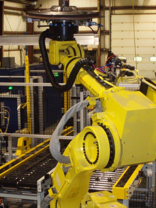 Burton Industries engineers & builds custom factory automation solutions, assembly #automation, #robotics, conveyors, material handling, and system integration.